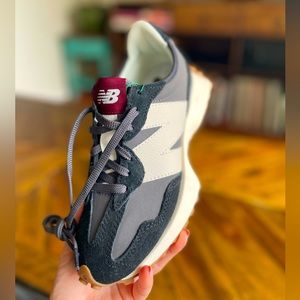 New Balance 327 sneaker. Size 5.5. Brand new, never worn. Black, grey, white.
